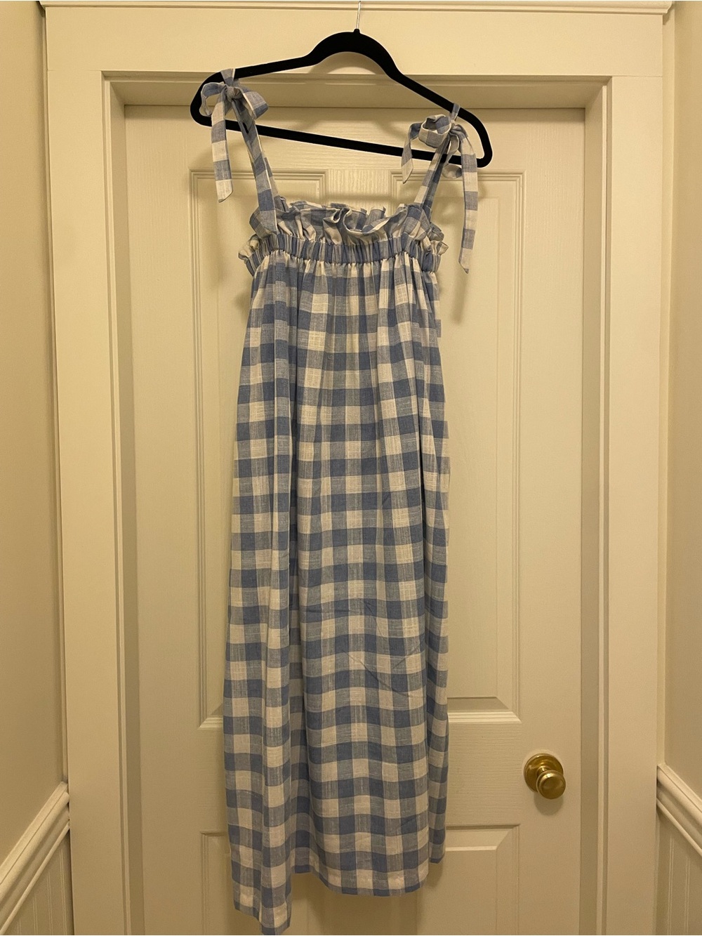 A Bronze Age blue and white gingham dress